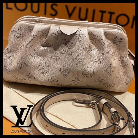 Louis Vuitton Mini Canteen Pouch .